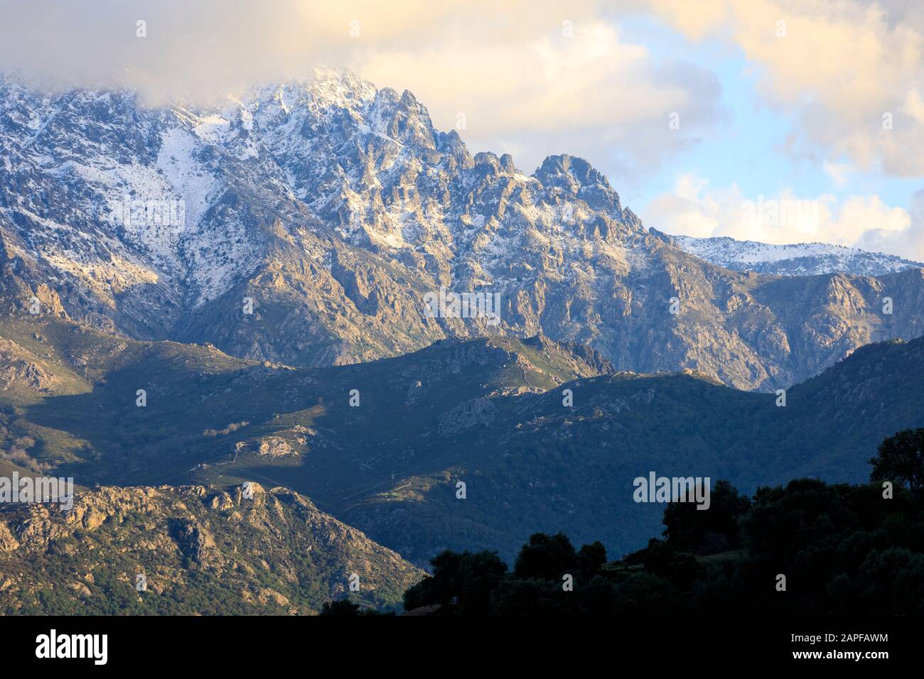 Snow capped mountains in the Balagne, Corsica Stock Photo - Alamy