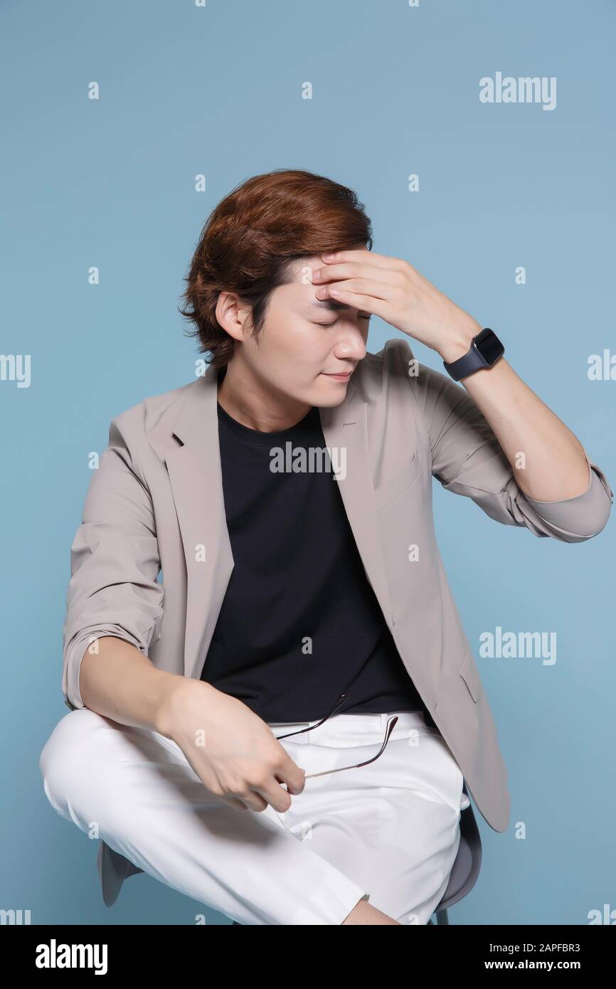 Close-up portrait of attractive young asian man, single man's lifestyle ...