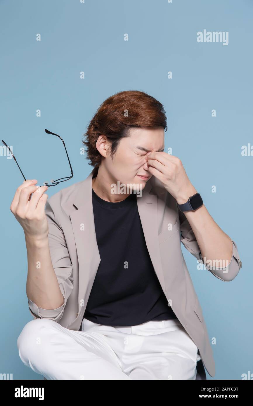 Close-up portrait of attractive young asian man, single man's lifestyle ...