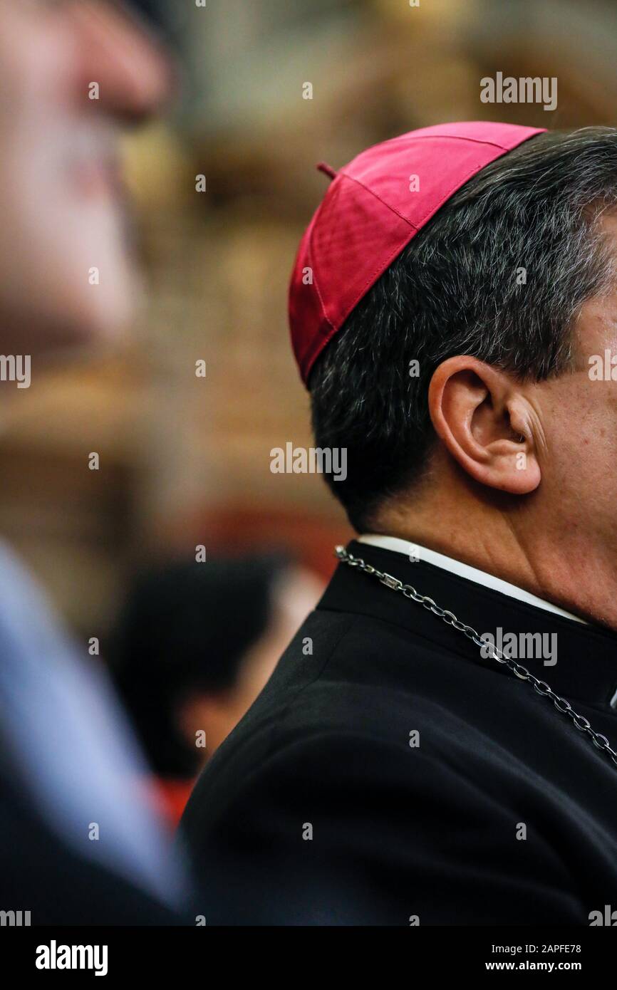 Details with a zucchetto - a small, hemispherical, form-fitting ecclesiastical skullcap worn by clerics of various Catholic churches on the head of a Stock Photo