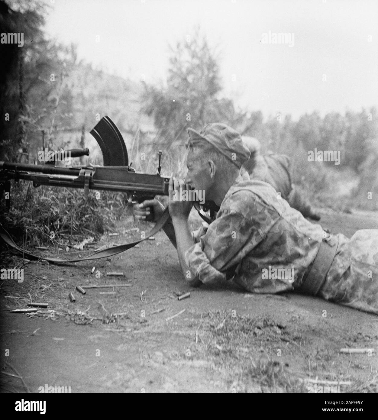 Bromo Description: [Brenschutter Shooting From Cover, Lying On The Road ...