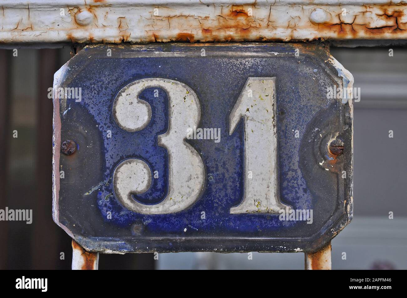 A house number plaque, showing the number thirty one (31) Stock Photo