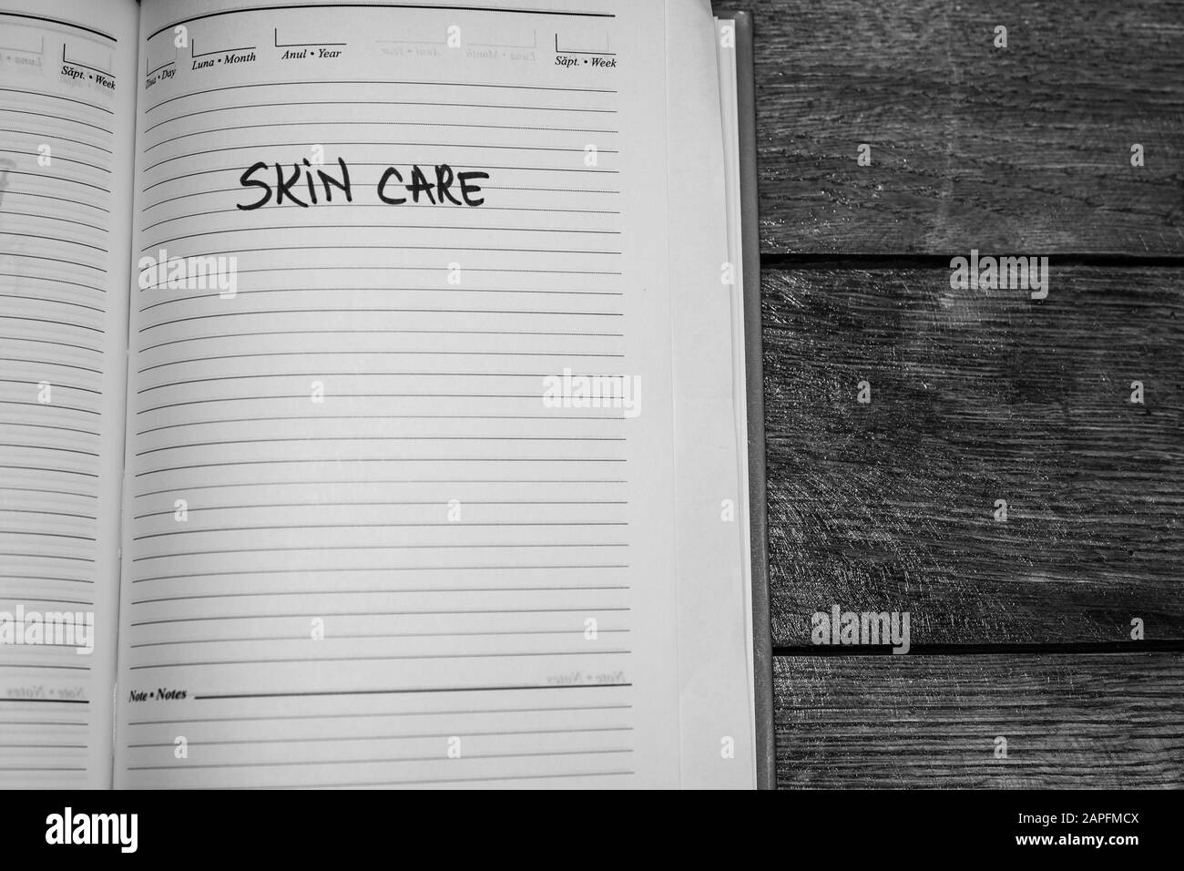 Skin care, handwriting text on page of office agenda. Copy space. Stock Photo