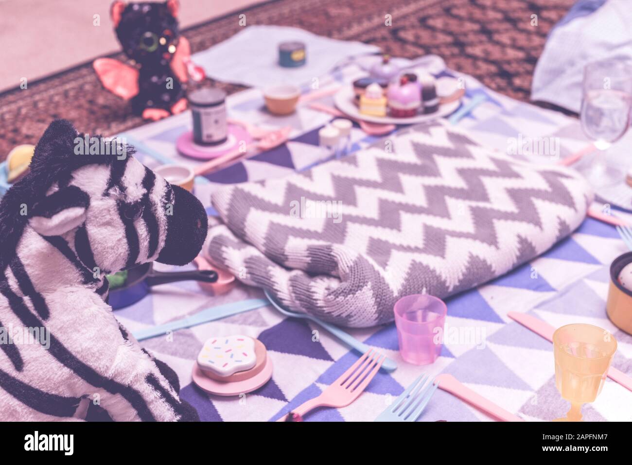 Kids Play Make Believe Tea Party With Children S Toys And Tea Set In Bedroom Stock Photo Alamy