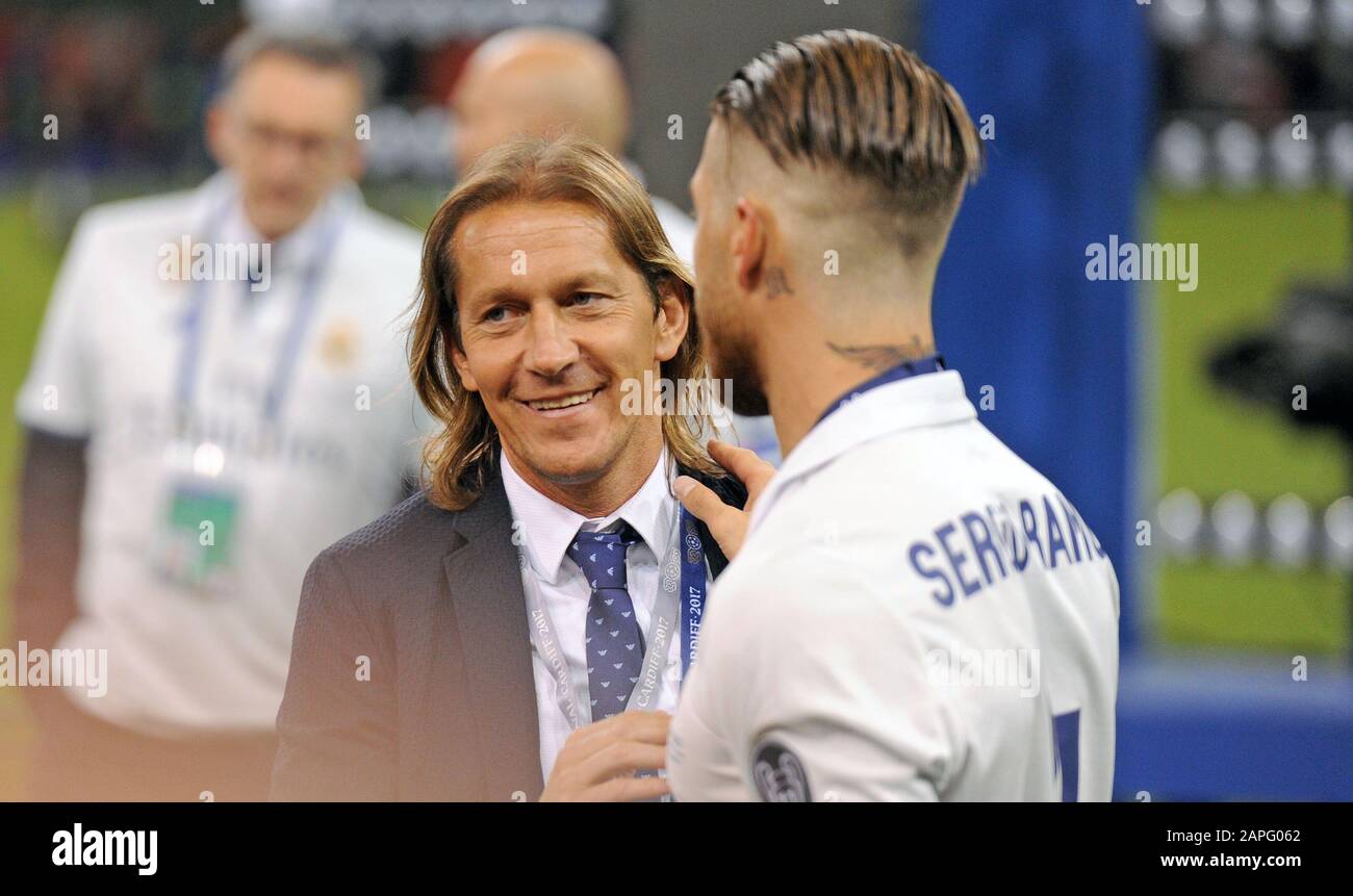 Former Real Madrid player Míchel Salgado with Sergio Ramos after the UEFA Champions League Final between Juventus and Real Madrid CF at the National Stadium of Wales in Cardiff Stock Photo
