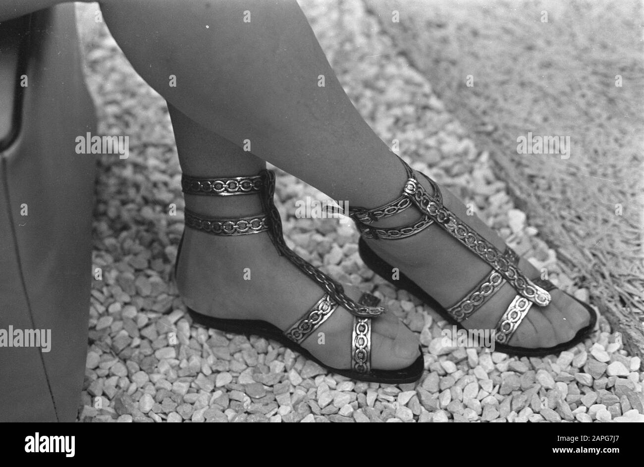 Utrechtse Jaarbeurs Description: Cleopatra a leather sandal in gold or silver color Date: January 8, 1968 Keywords: sandals Stock Photo