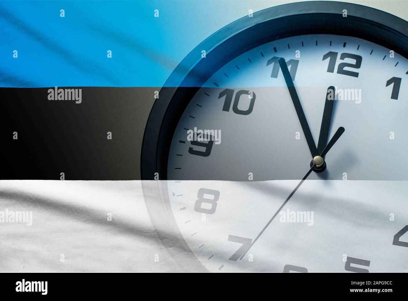 Estonia flag with dial of a clock Stock Photo