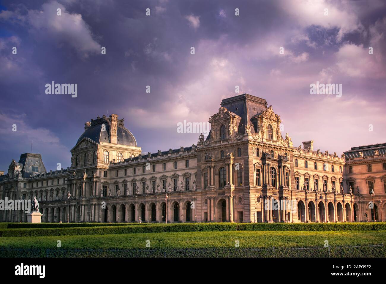 louvre museum on a sunset evening Stock Photo