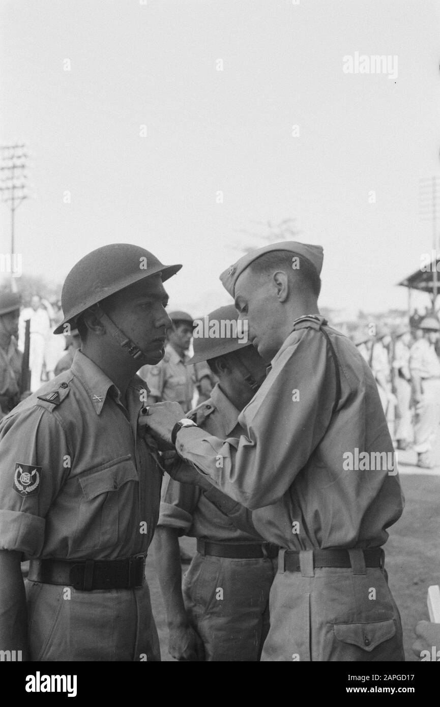 Award Sergeant J. Muller and Corporal M.J.B. Baggerman at Bandoeng Description: Collection Photo Collection Service for Army Contacts Indonesia, photon number 265-1-6 Date: July 1947 Location: Bandung, Indonesia, Dutch East Indies Stock Photo