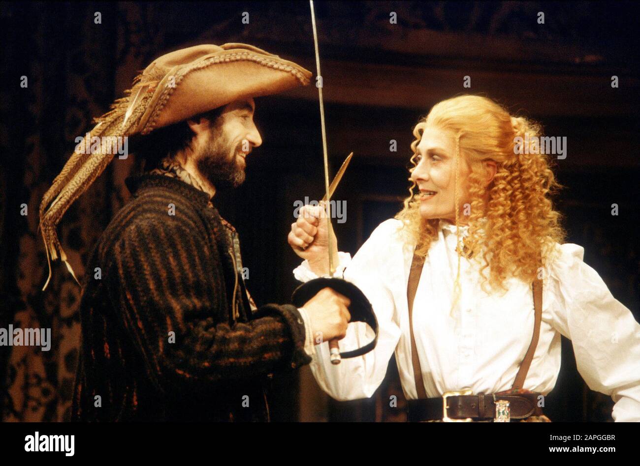 Timothy Dalton (Petruchio) and Vanessa Redgrave (Katherina) in THE TAMING OF THE SHREW by Shakespeare directed by Toby Robertson at the Theatre Royal Haymarket, London in 1986. Vanessa Redgrave, actress and political activist, born in London in 1937. Awarded CBE in 1967. In a long-term relationship with Timothy Dalton from 1971 to 1986. Stock Photo