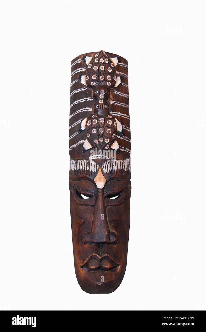 African wooden mask close-up isolated on a white background Stock Photo