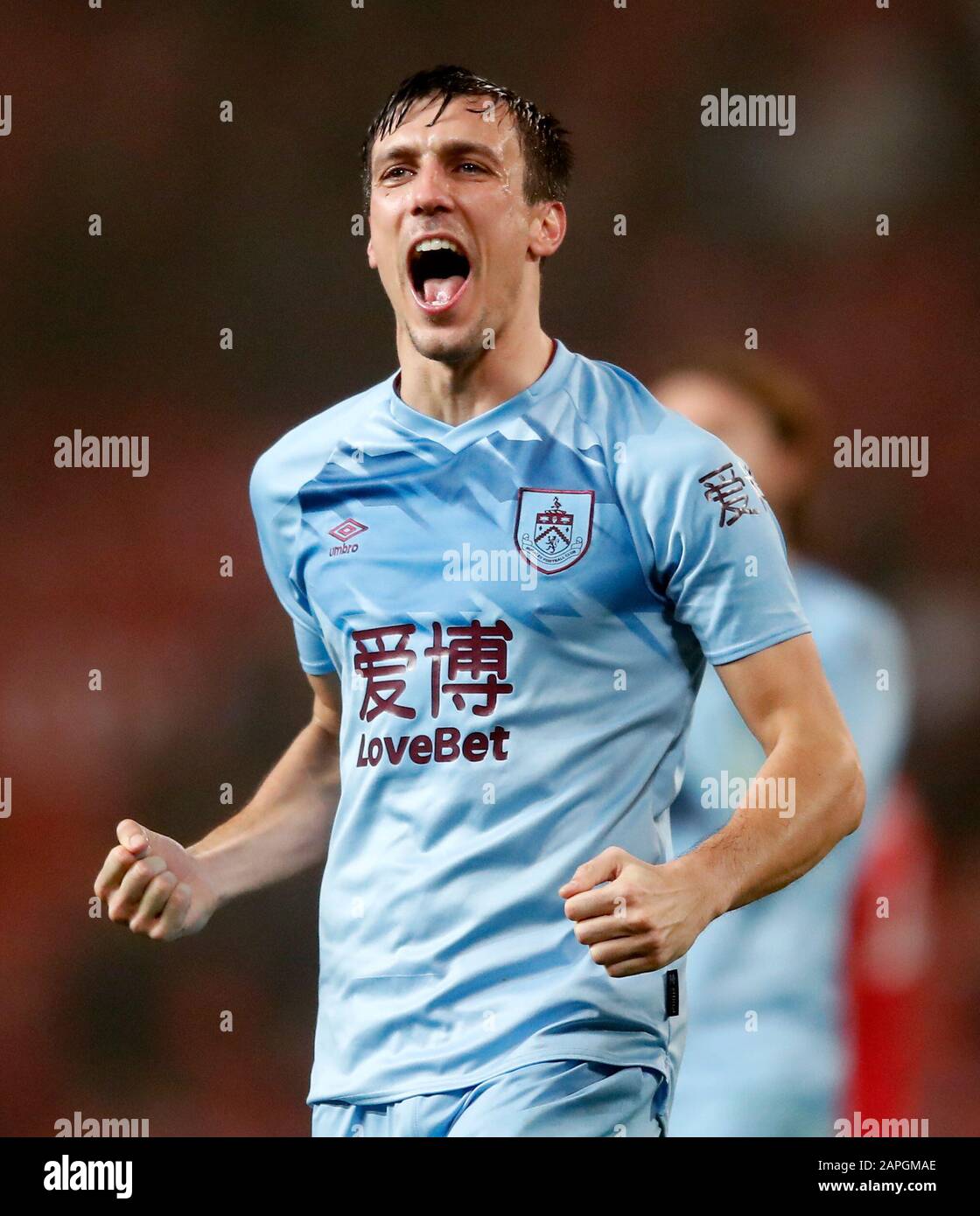 Burnley's Jack Cork celebrates the results at the end of the Premier League match at Old Trafford, Manchester. Stock Photo