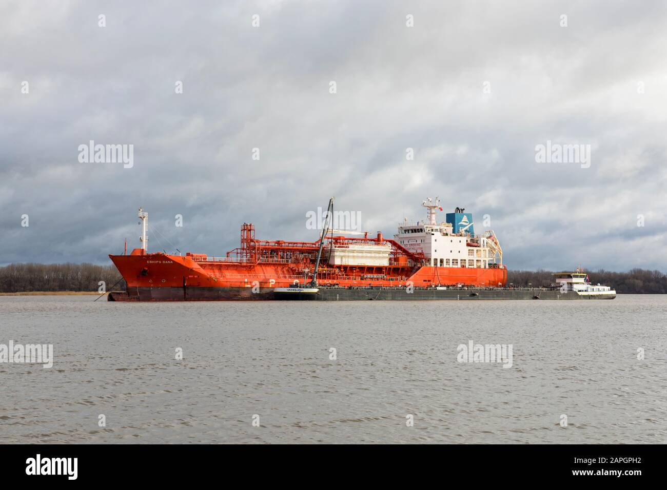 Stade, Germany - January 22, 2020: LPG tanker ESHIPS DANA and oil tanker VANQUISH  moored on Elbe river Stock Photo
