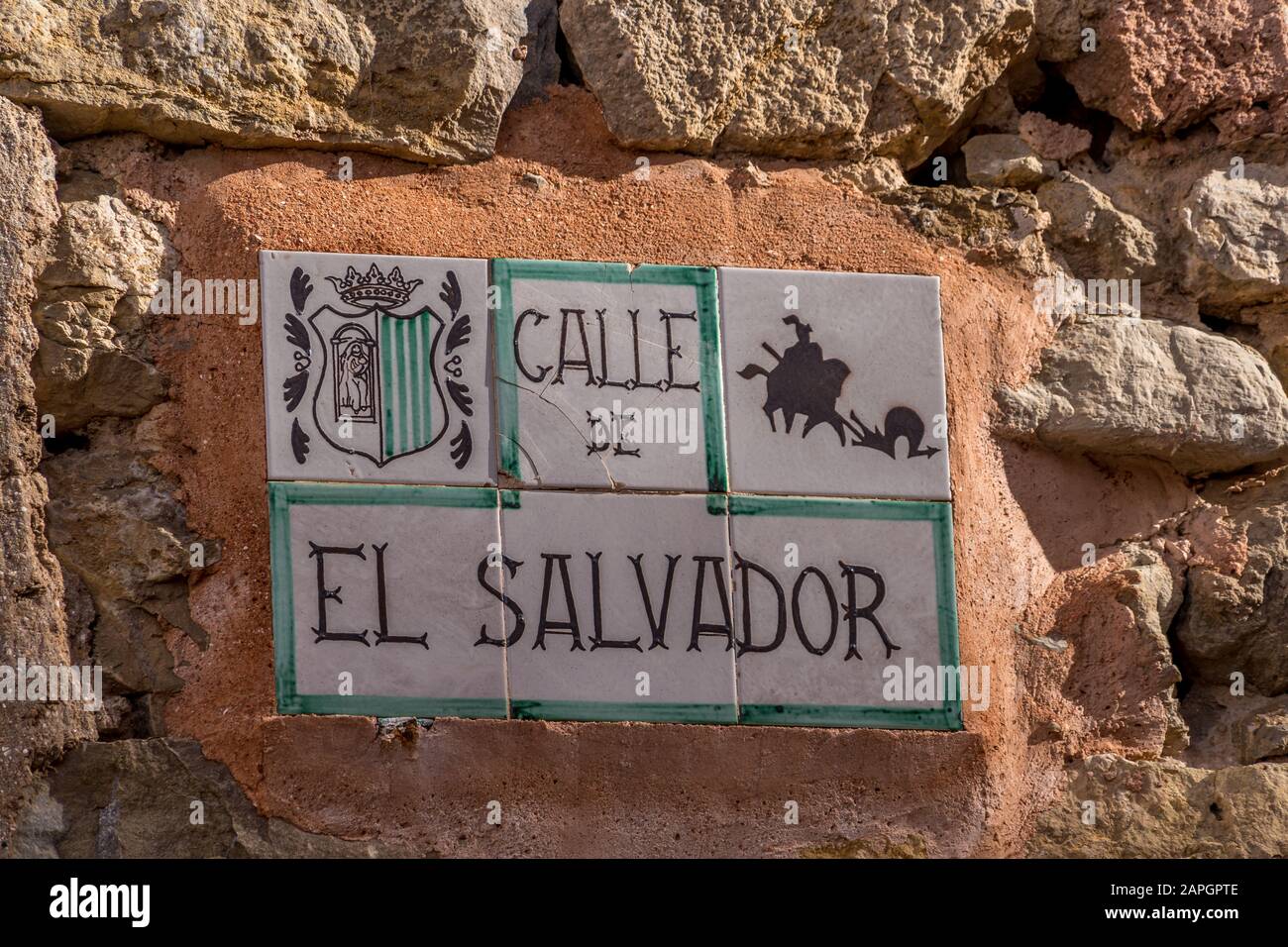 El Salvador the savior street sign with drawings of a knight and coat of arms in Albarracin Spain Stock Photo