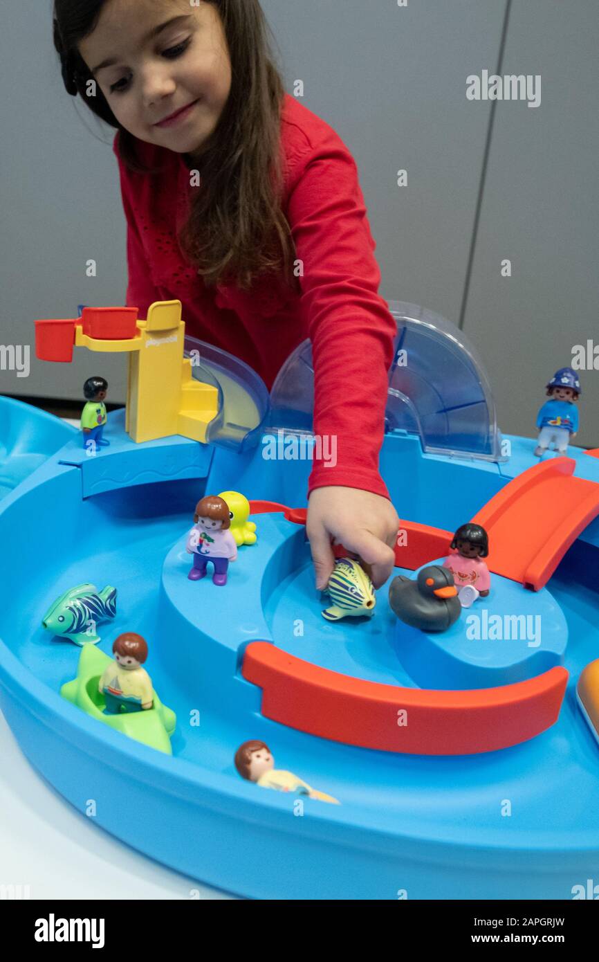 Nuremberg, Germany. 23rd Jan, 2020. Tea plays the game "1.2.3 Aqua" by  Playmobil on the fringes of the main press conference for the 71st Toy Fair  in the Exhibition Centre Nuremberg. The