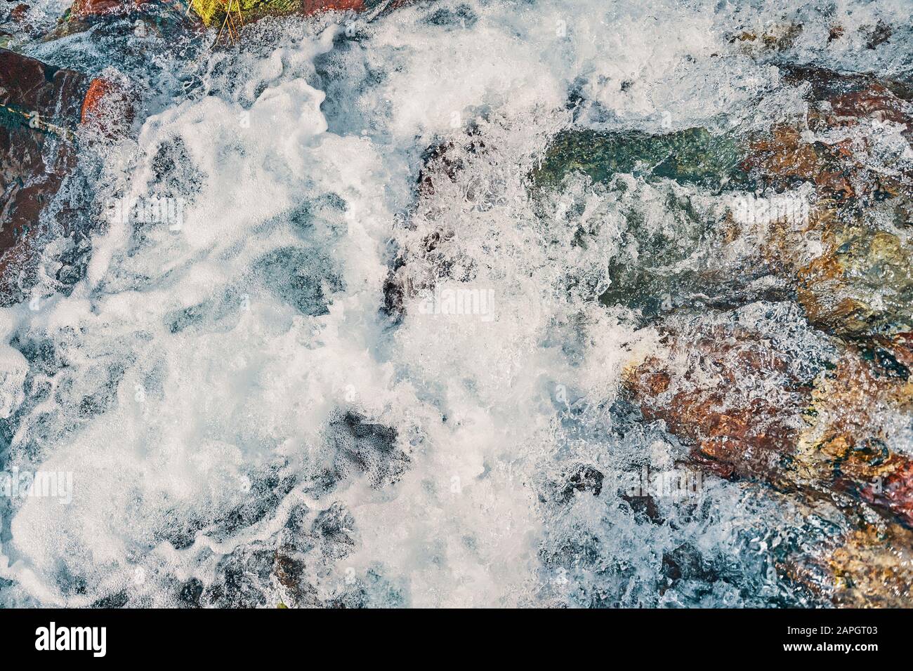 River in the mountains. The course of the rivulet in the rocky hill ...