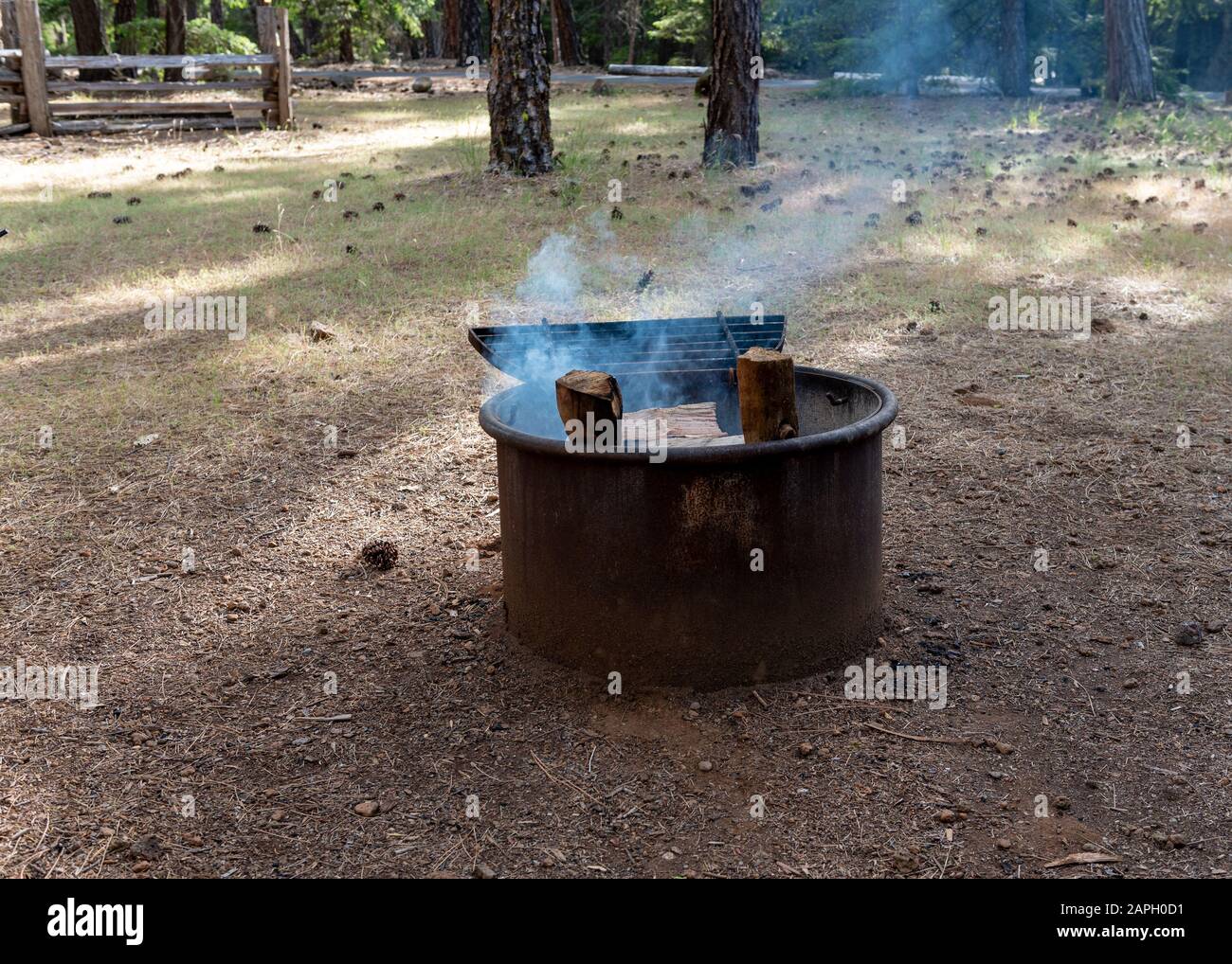Typical fire ring with grill at a California State Park campground made