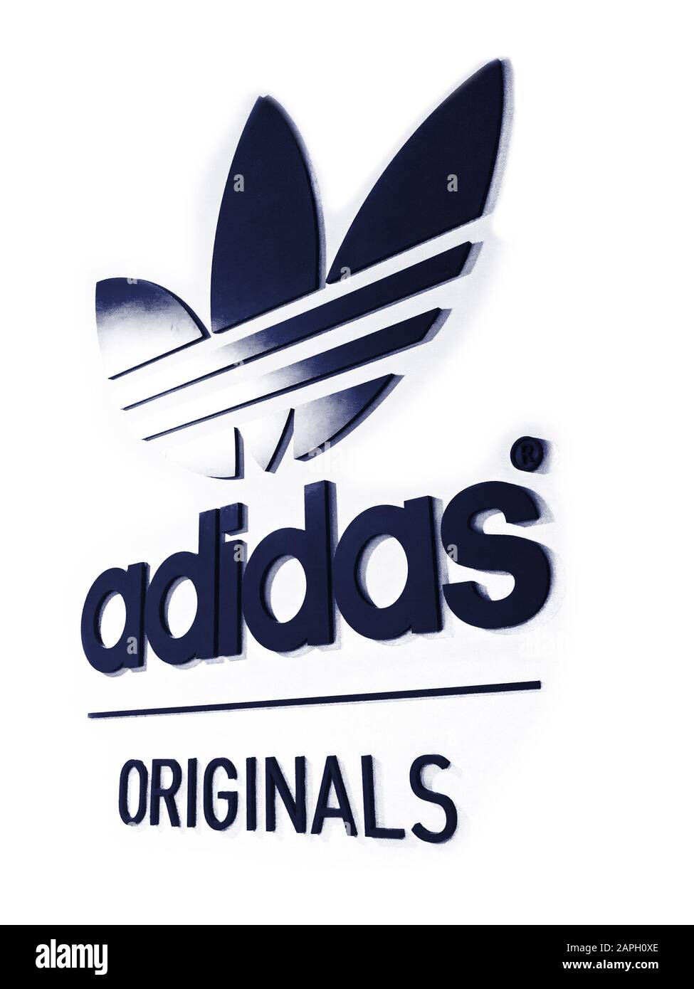 the Adidas Originals, logotype placed on white wall Stock Photo - Alamy