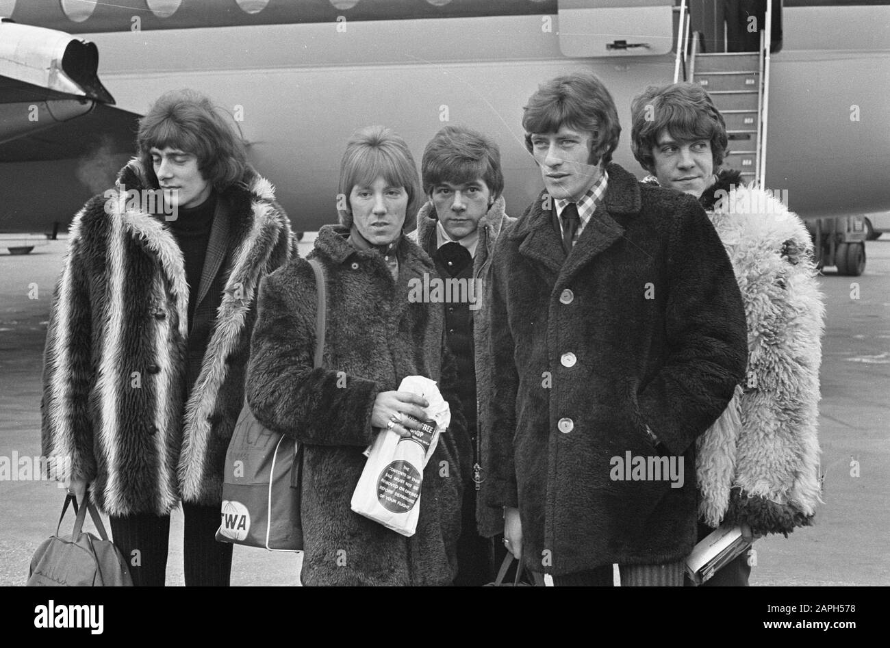 Dave Dee arriving at Schiphol Airport, January 1967. Dave far right, with sheep skin jacket.; Stock Photo