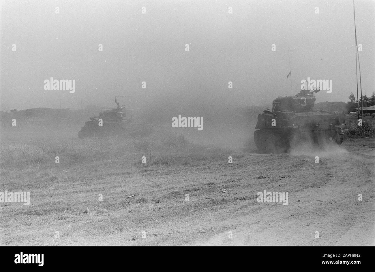 [British general E.C. Mansergh visiting a British Indian tank unit] [maneuvers with Sherman tanks] Date: 1946 Location: Indonesia, Dutch East Indies Stock Photo