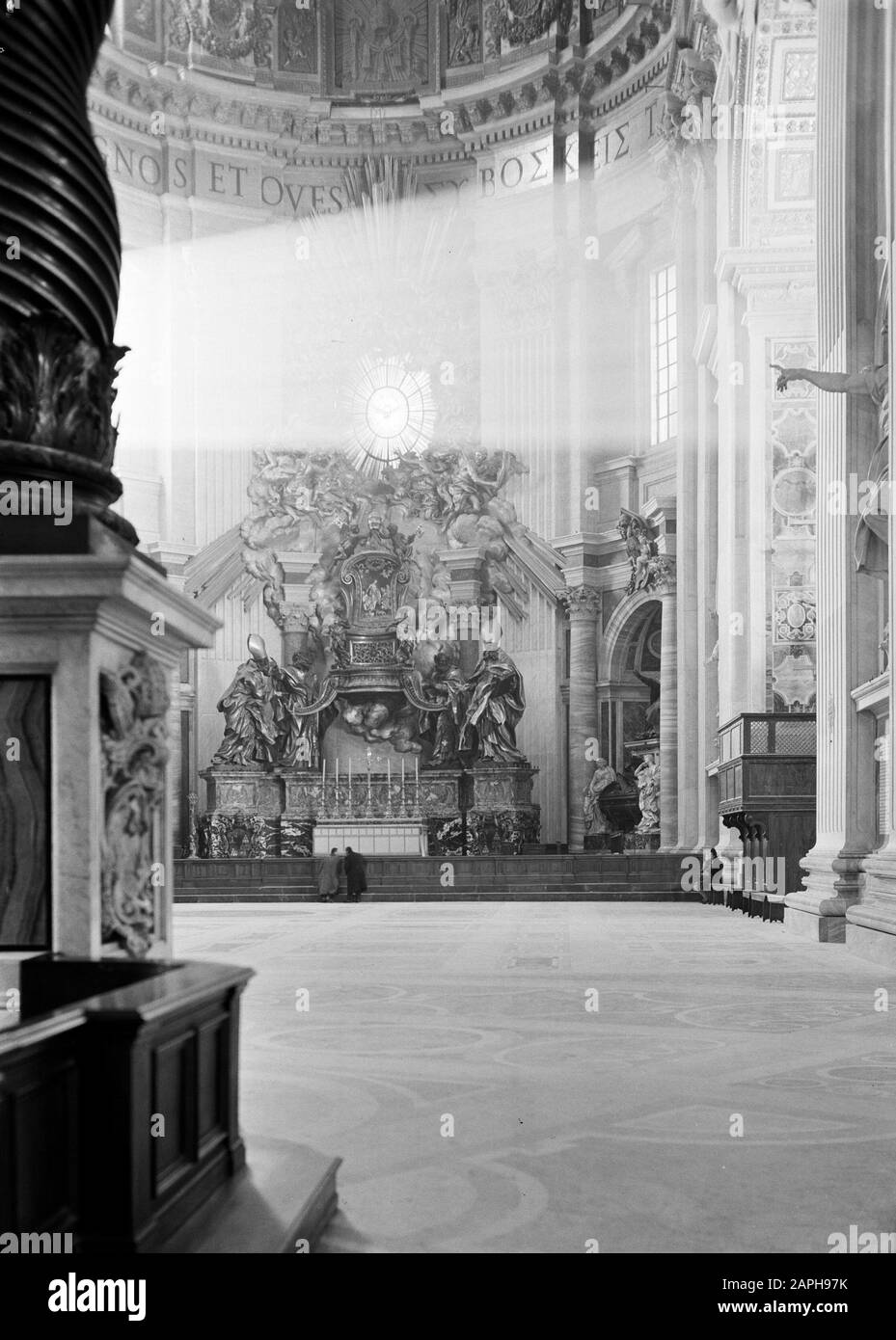 Rome: Visit to Vatican City Description: The Cathedra Petri designed by Bernini in the abse of St. Peter's Basilica Date: December 1937 Location: Italy, Rome, Vatican City Keywords: architecture, baroque, etc. sculpture, interior, church buildings Institution name: Sint Pieter Stock Photo