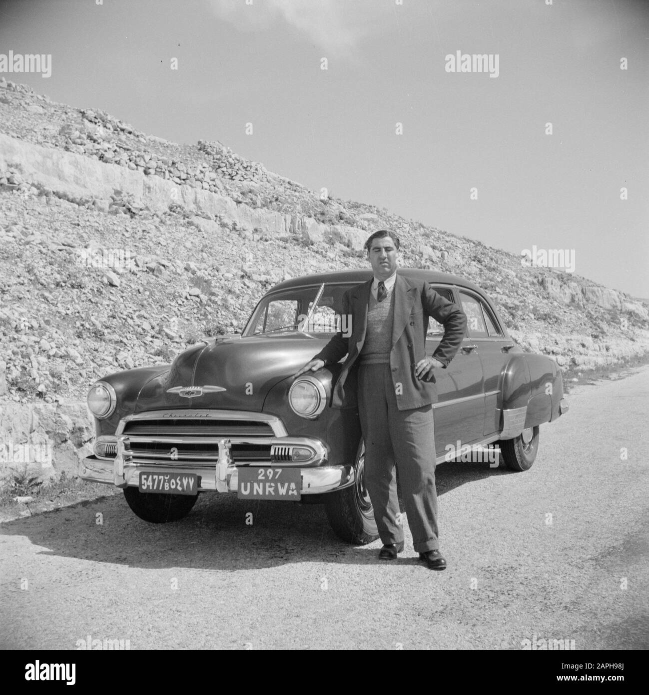 Middle East 1950-1955: Jordan Description: The driver 'Rene' for a  Chevrolet car Annotation: At the