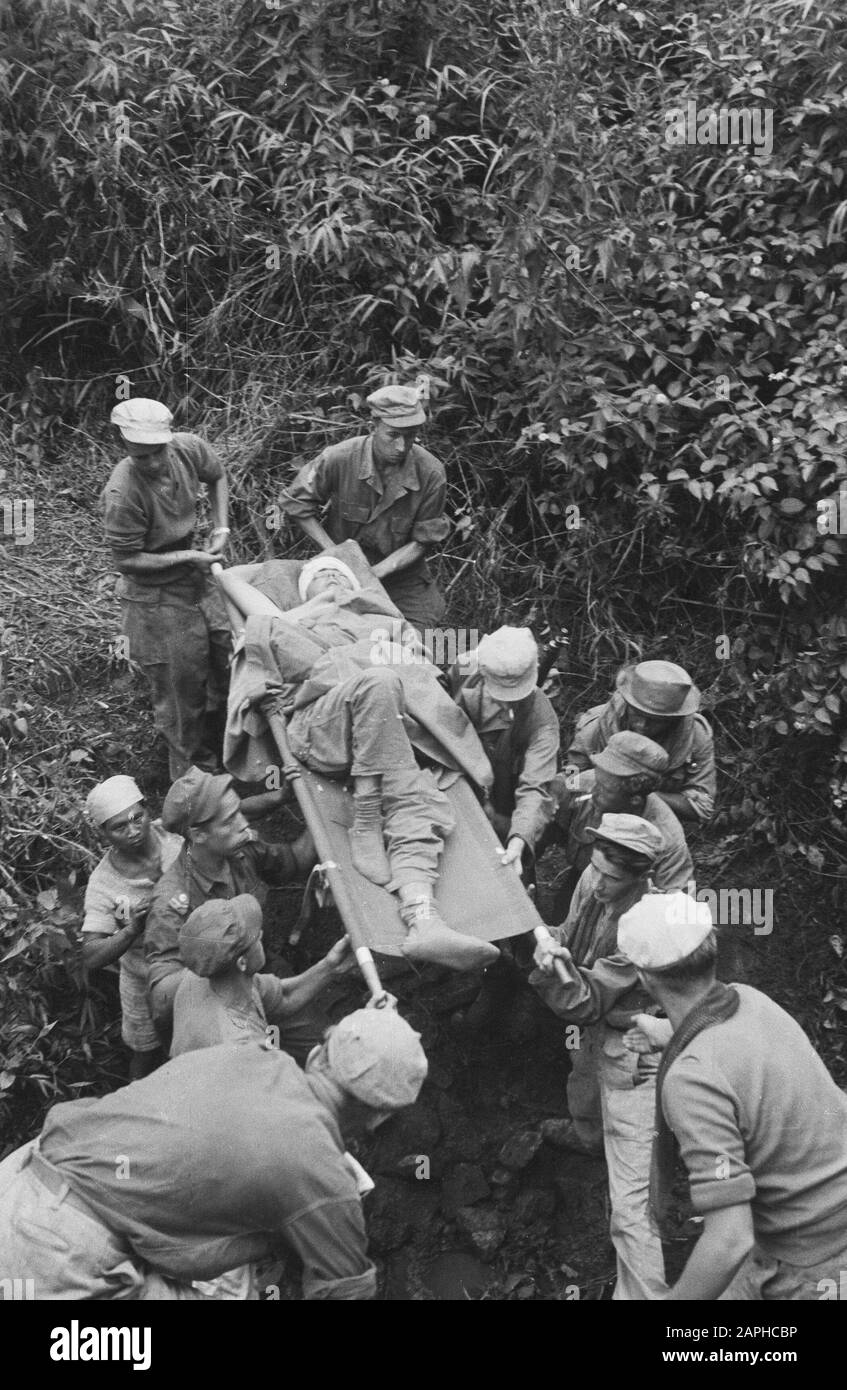 Wounded man on stretcher hi-res stock photography and images - Alamy