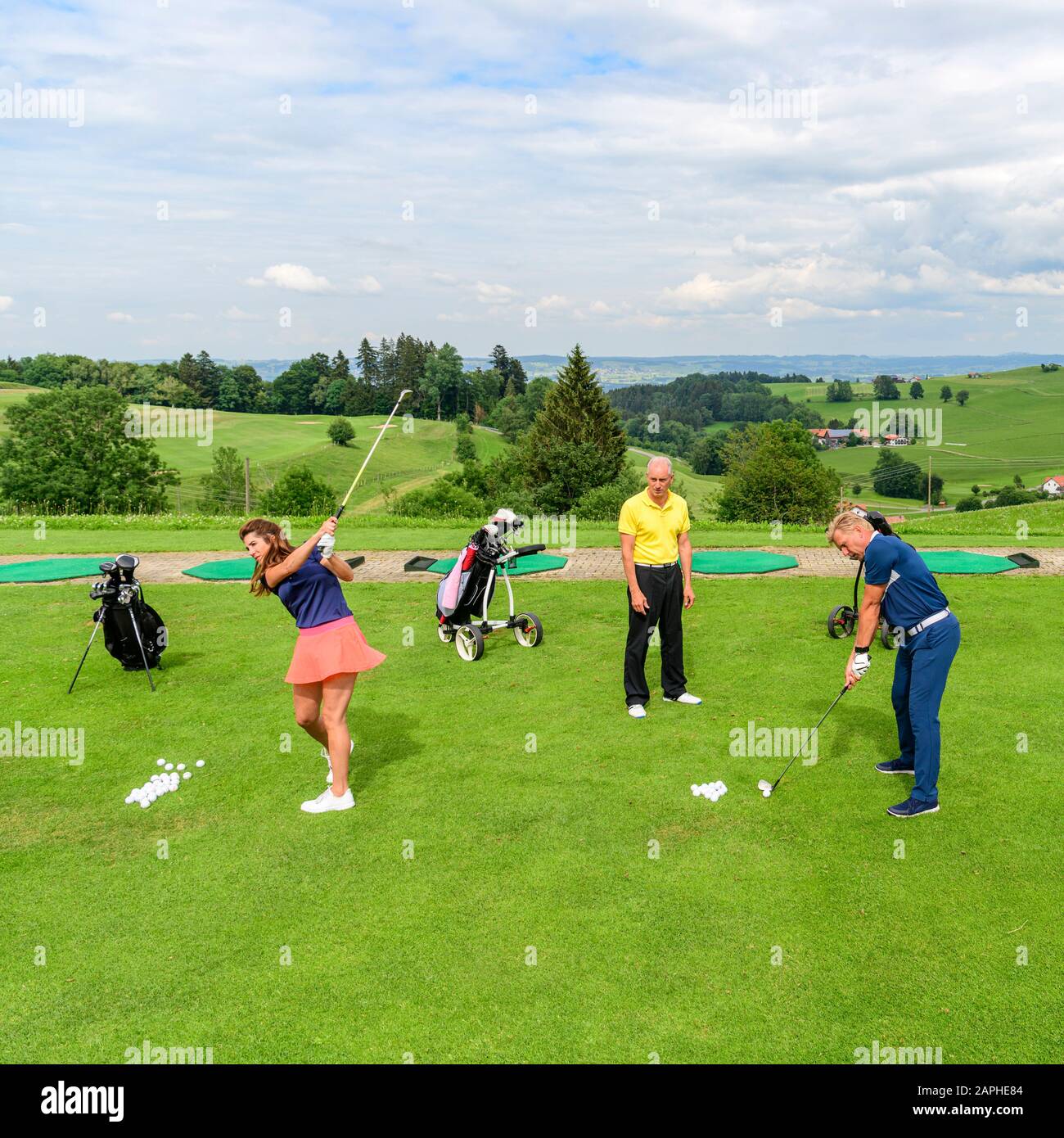 Trainerstunde mit einem Pro auf einer Golfanlage Stock Photo
