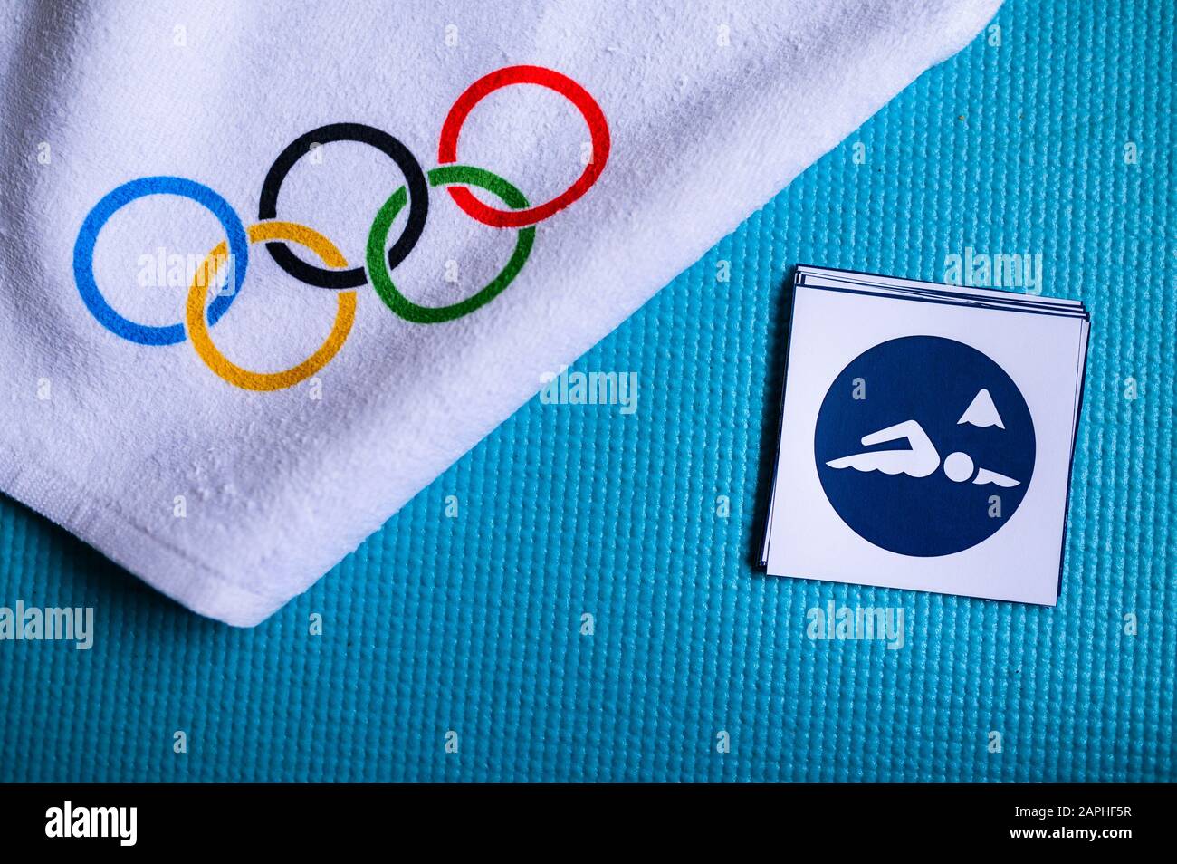 TOKYO, JAPAN, JANUARY. 20. 2020: Marathon Swimming pictogram and olympic rings. Original wallpaper for olympic game Stock Photo