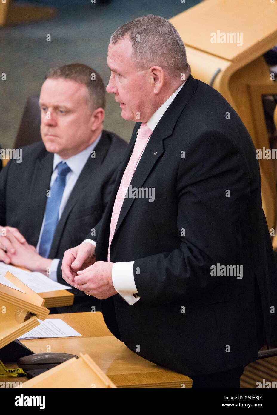 Edinburgh, UK. 23rd Jan, 2020. Pictured: (right) Richard Lyle MSP for the Scottish National Party (SNP). Scenes from the chamber at Holyrood in the Scottish Parliament. Education & Skills: Stage 1 Debate: Consumer Scotland Bill. Credit: Colin Fisher/Alamy Live News Stock Photo
