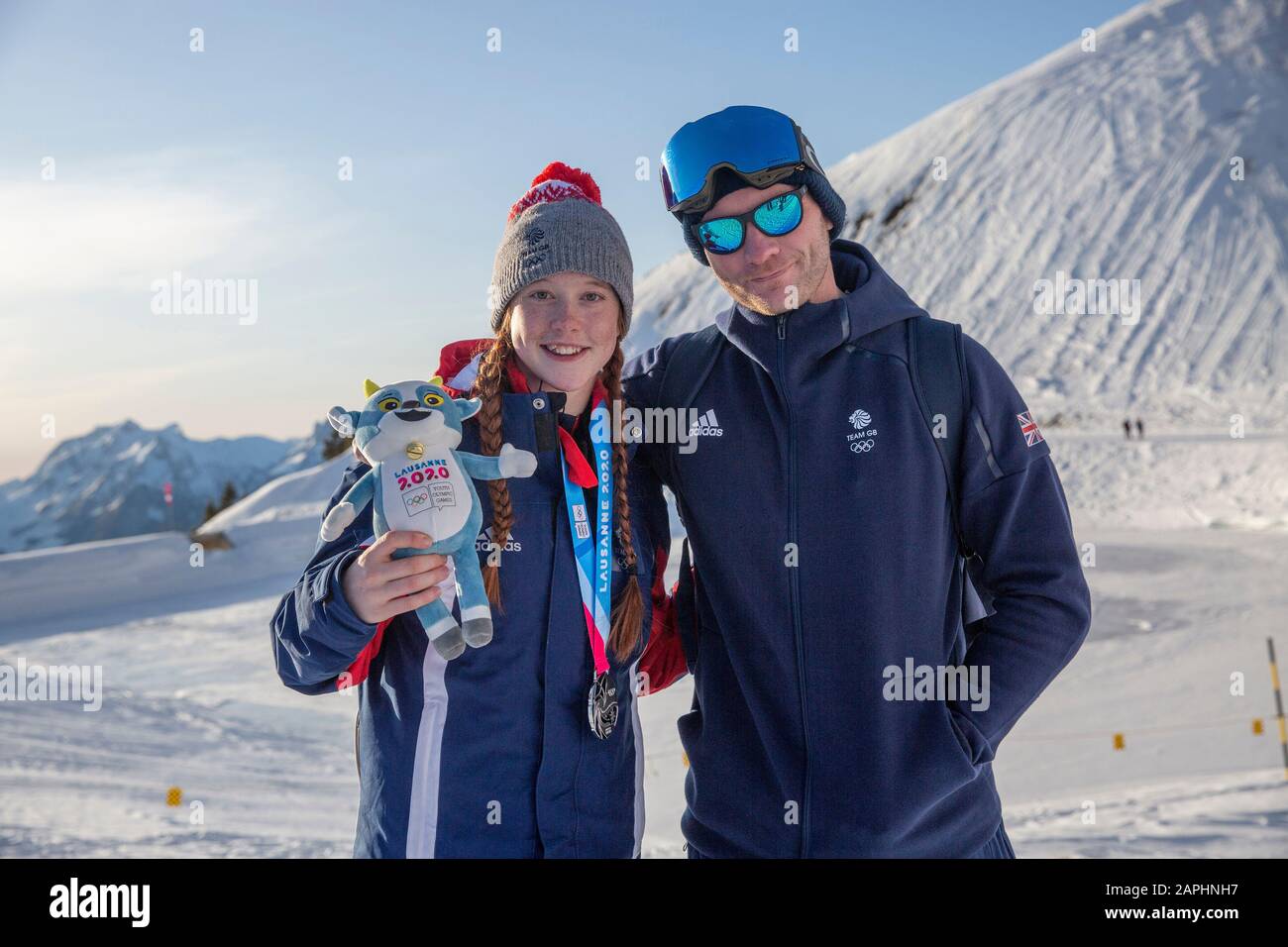 Team GB’s Kirsty Muir (15) following winning silver at Women’s Freeski Big Air with coach Joe Tyler during the Lausanne 2020 Youth Olympic Games. Stock Photo