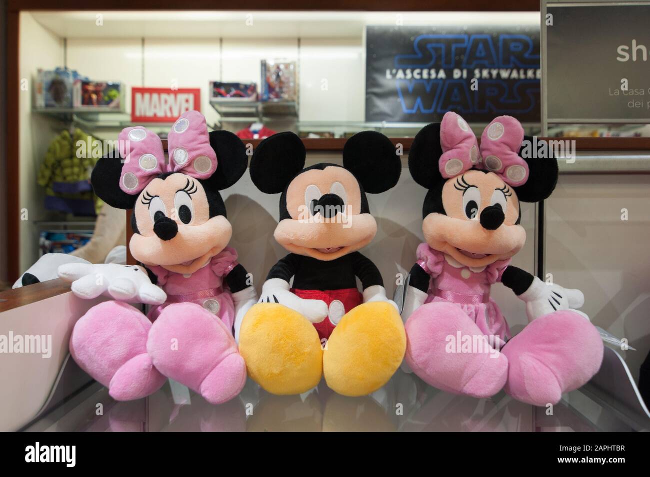 Florence, Italy - 2020, Jan 19: Three dolls (Mickey Mouse and Minnie) in a  row, on a shelf in a Disney store Stock Photo - Alamy