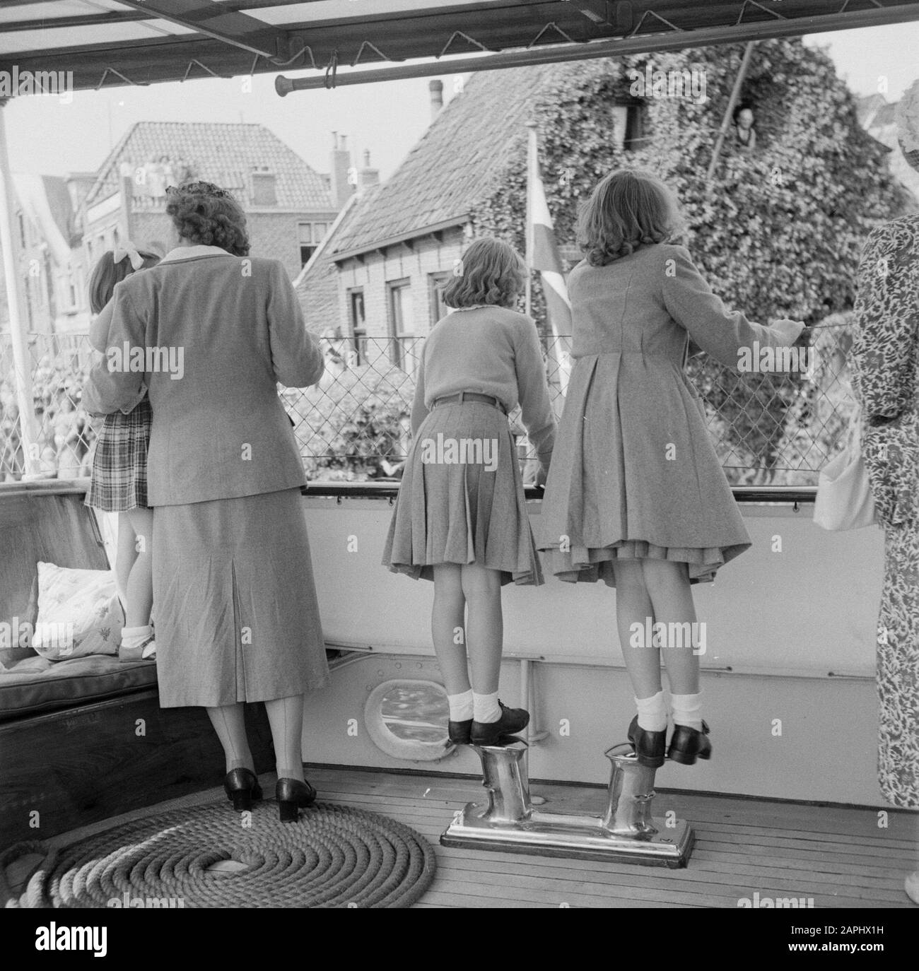 The princesses Juliana, Beatrix, Irene and Margriet seen on the back on ...