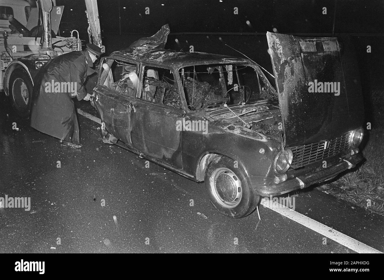 Burnt out car Description: The remnants of the Fiat 124, on the Hoogweg. The accident cost a person's life Date: September 15, 1968 Keywords: car wrecks, fires Stock Photo
