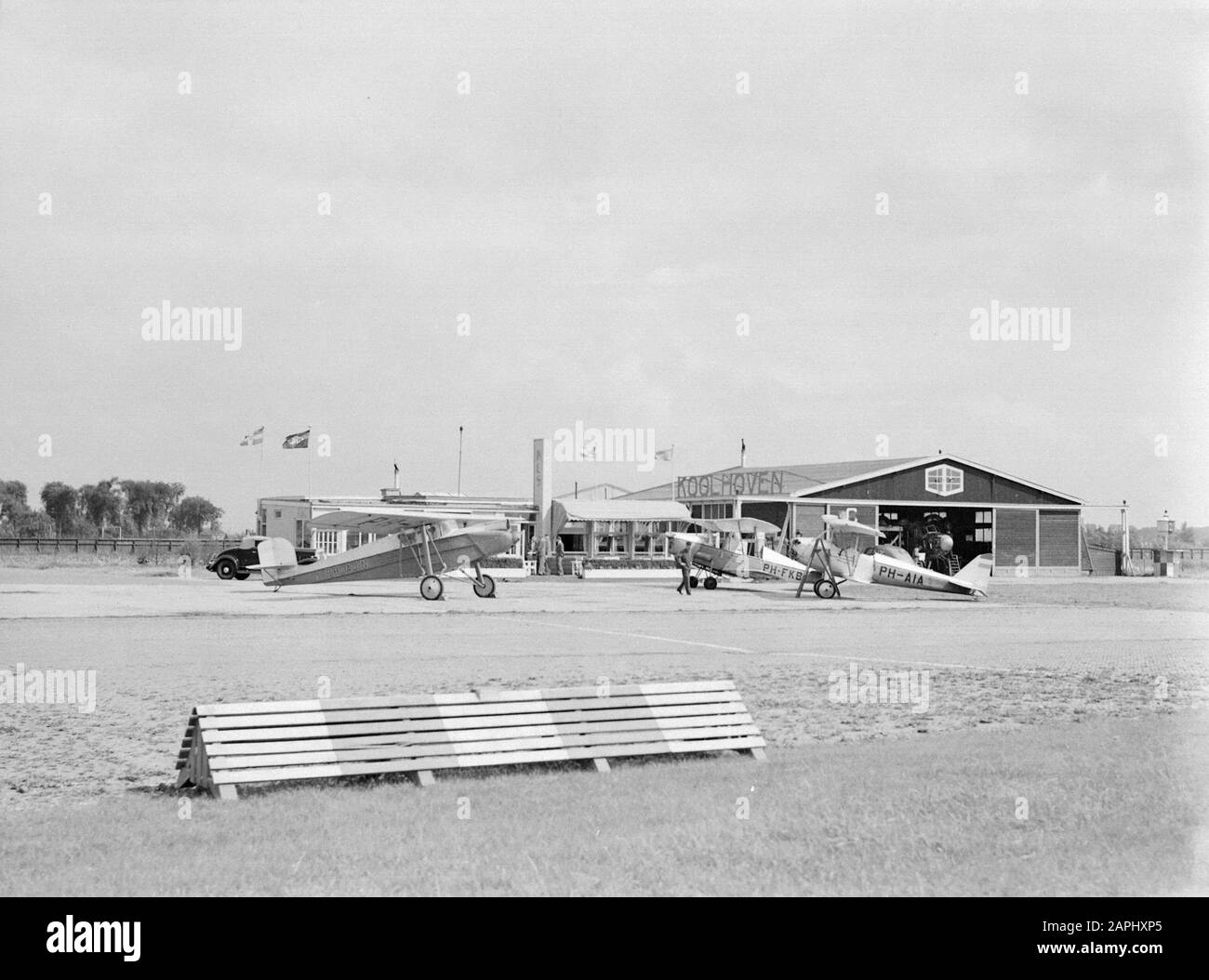 National Aviation School Holland Description: The Rotterdam Airport Waalhaven with the clubbuilding of the Dutch Aviation School next to the Koolhoven aircraft factory. From left to right are lined up: A Koolhoven Fk-41 (PH-AJN), a Koolhoven FK-46 (PH-FKB) and a Pander EF-85 (PH-AIA) Date: 1935 Location: Rotterdam, Waalhaven Keywords: aircraft, aircraft industry Personal name: Koolhoven Frits Stock Photo