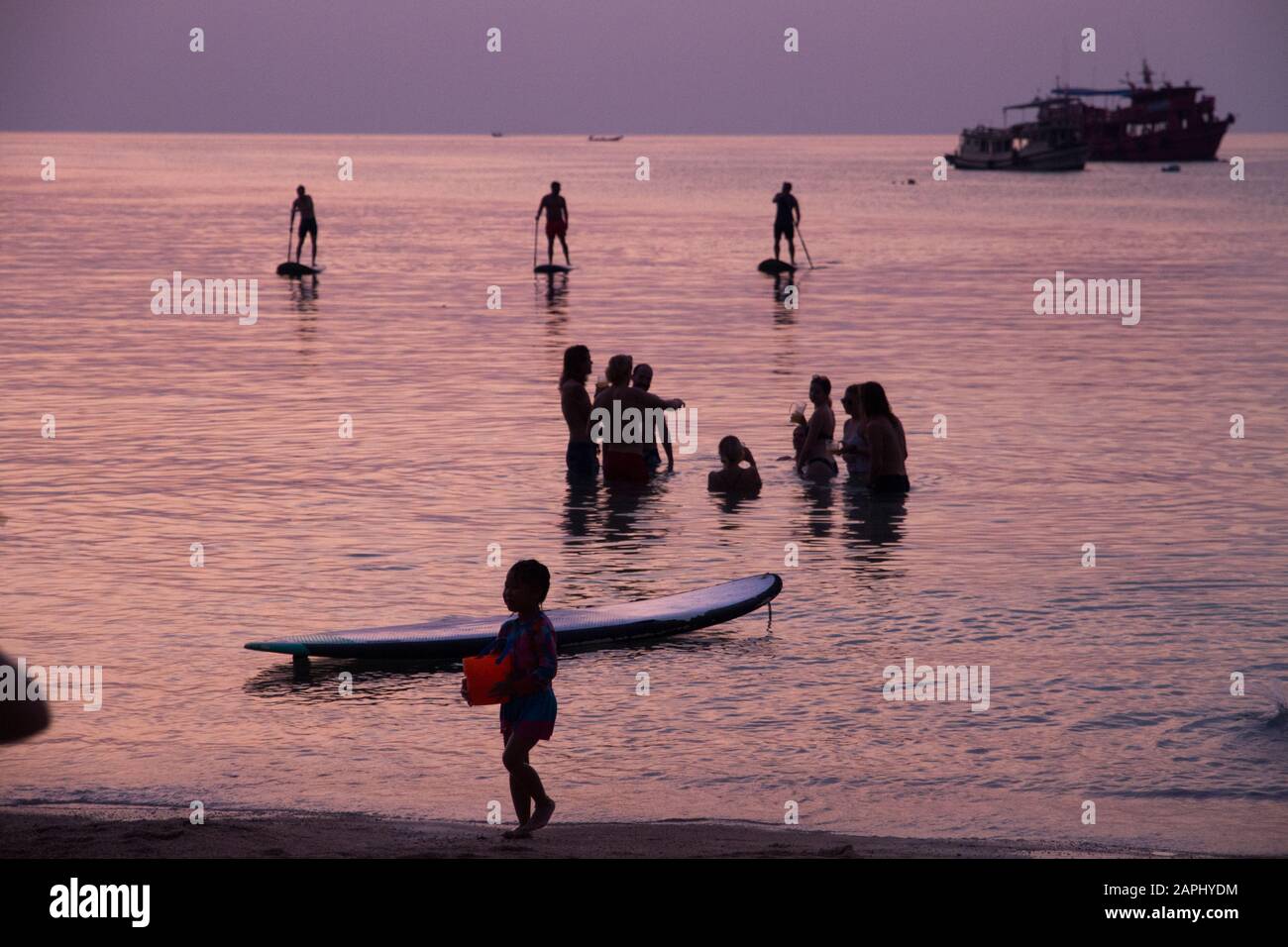 Koh Tao evening sunset, people in the sea water, Thailand Stock Photo