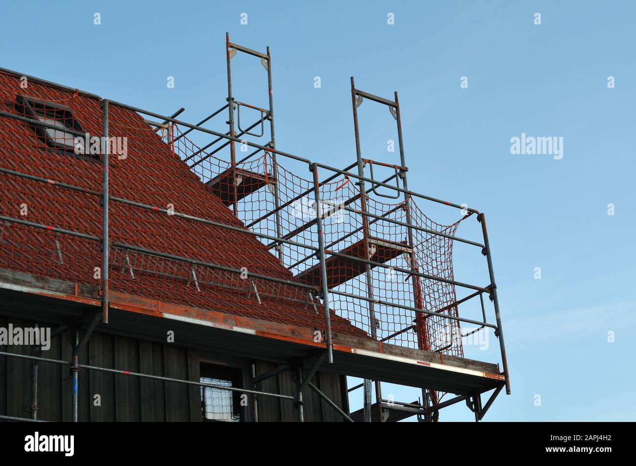 Rooftop Of A House Under Renovation With A Metal Scaffold With Safety Net Stock Photo Alamy Rooftop Of A House Under Renovation With A Metal Scaffold With Safety Net Stock Photo Alamy