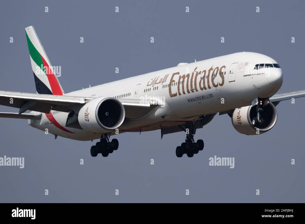 Budapest / Hungary - April 8, 2019: Emirates Airlines Boeing 777-300ER A6-EGK passenger plane arrival and landing at Budapest Airport Stock Photo