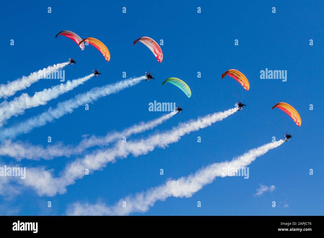 Powered paragliders in flight Stock Photo