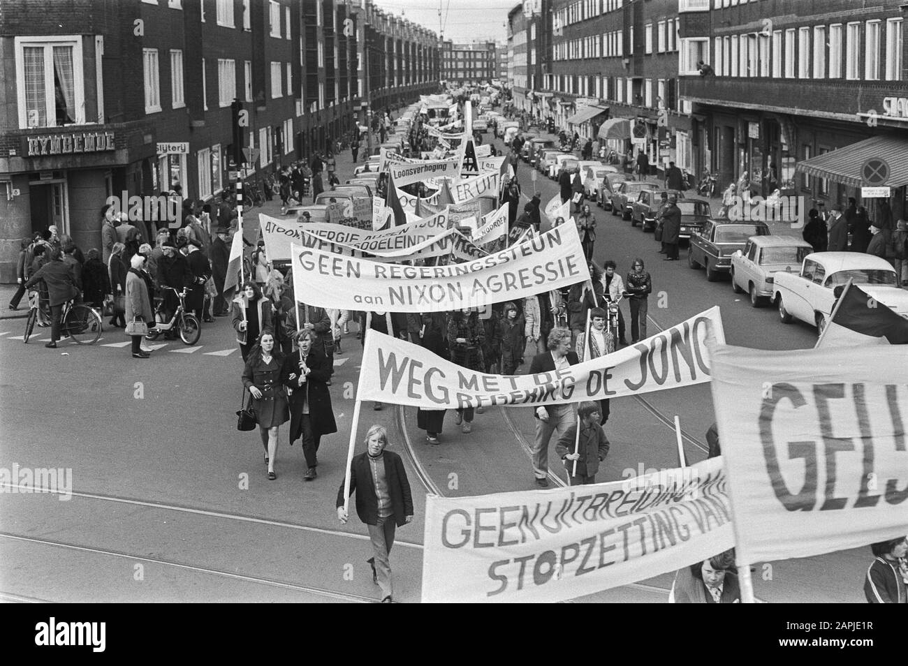 Demonstrative parade in Amsterdam by the Communist Party Description: Protesters with banners and flags draw through the streets of Amsterdam Date: March 27, 1971 Location: Amsterdam, Noord-Holland Keywords : demonstrations, banners, flags Institution name: CPN Stock Photo