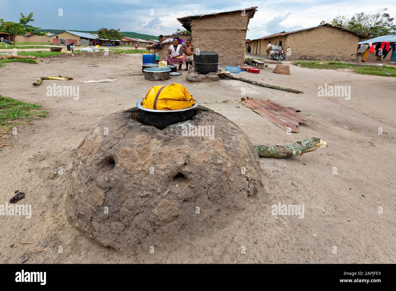 Banana dish known as Matooke is being cooked on top of a domed, earthenware oven, Lake George, Uganda. Stock Photo