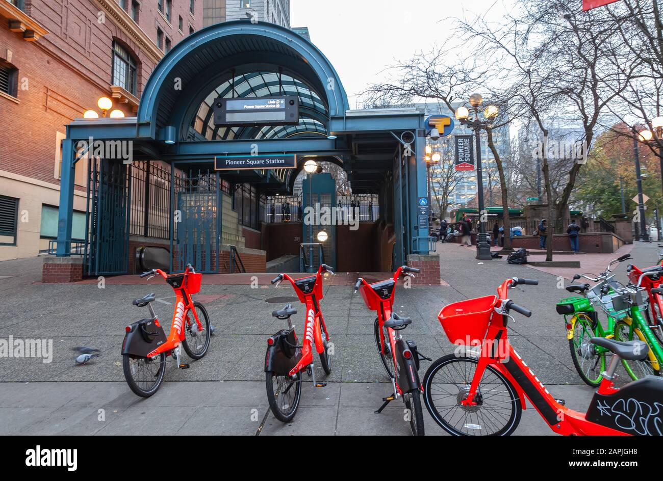 Rental bikes park at the entrance of the Pioneer Square Link Station