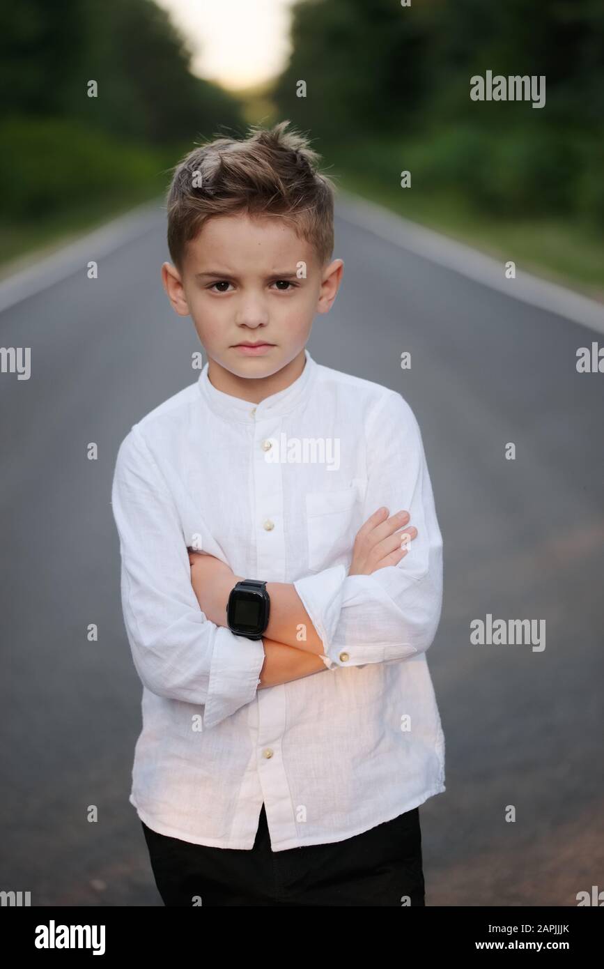 Portrait Of Young Handsome Boy With Stylish Haircut Stock Photo