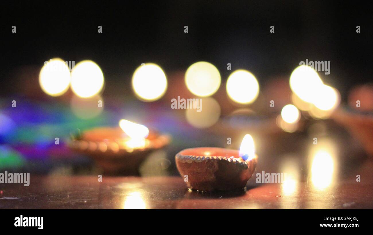 Indian burning soil lamp at Diwali night. Stock Photo