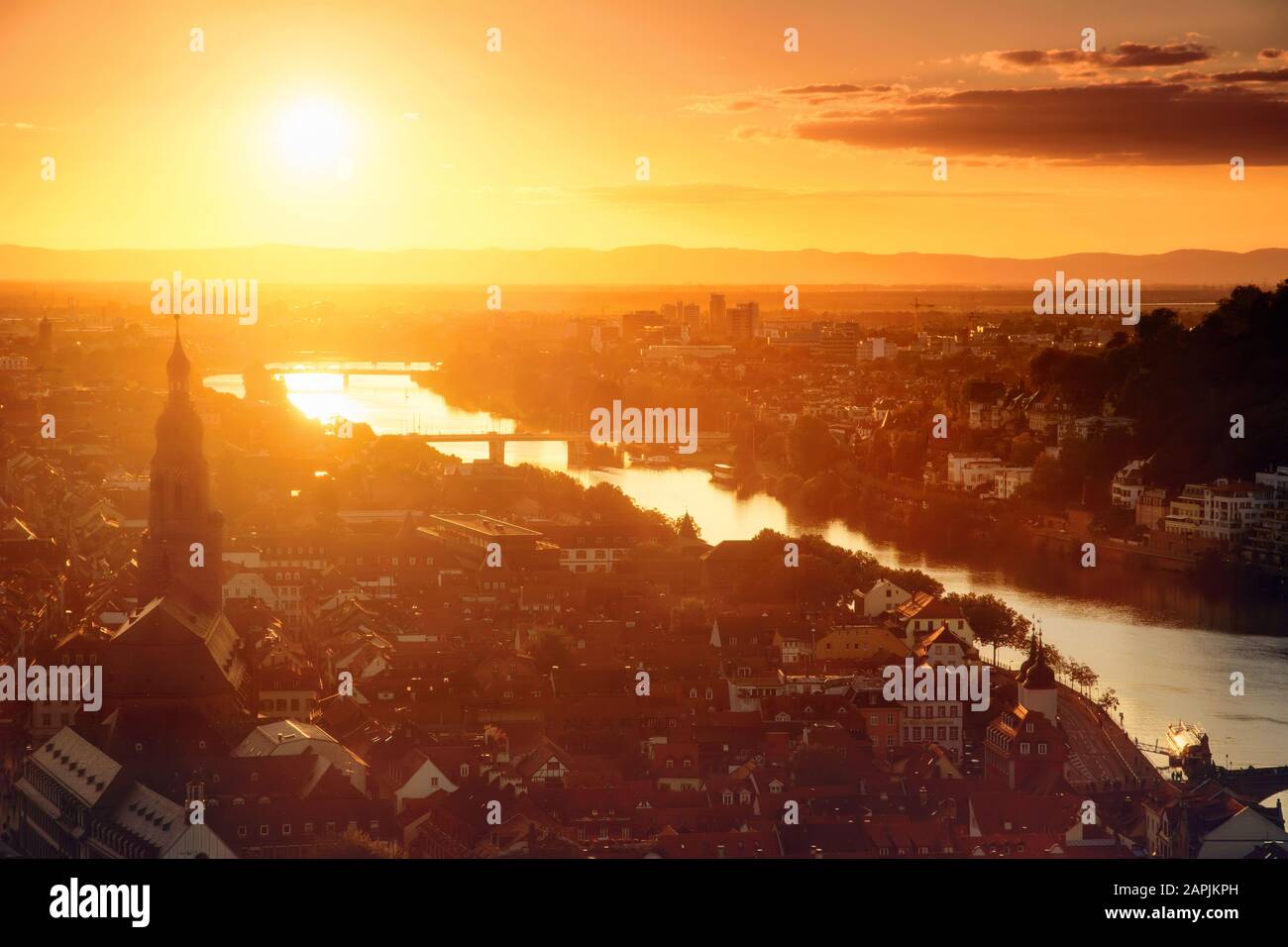 Heidelberg, Germany, romantic aerial view in gold light before sunset, with the old town and the Neckar river Stock Photo