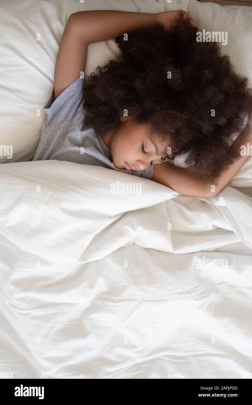 Beautiful African American Girl Lying High Resolution Stock Photography