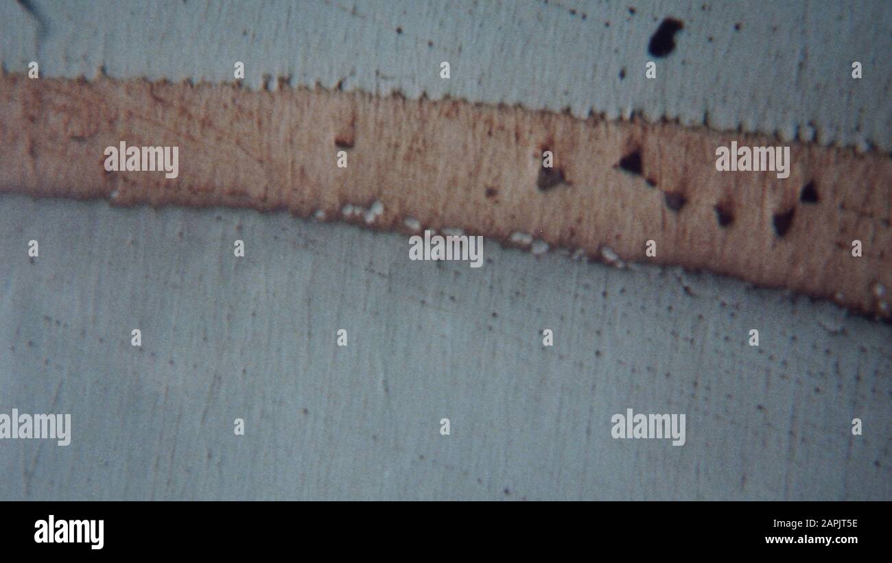 micrograph of a furnace brazed copper joint 5mm diameter steel bar brazed into a steel block by