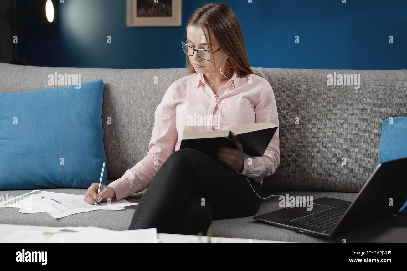Female studying at home Stock Photo