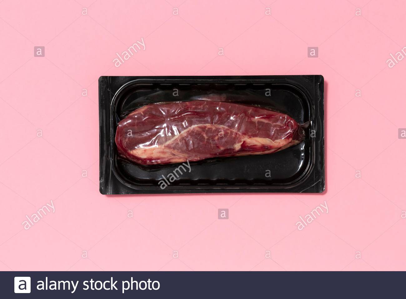 Download Black Plastic Pack With Fresh Beef Steak Isolated On Pink Background Raw Meat Packed Without Label Top View Vacuum Packed Stock Photo Alamy