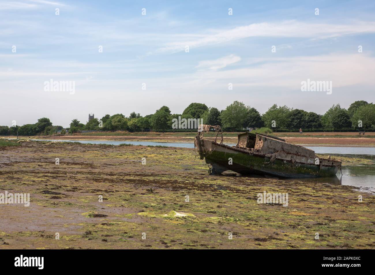 A wreck in Stoke Lake at low tide, Alverstoke, Gosport, Hampshire, UK Stock Photo